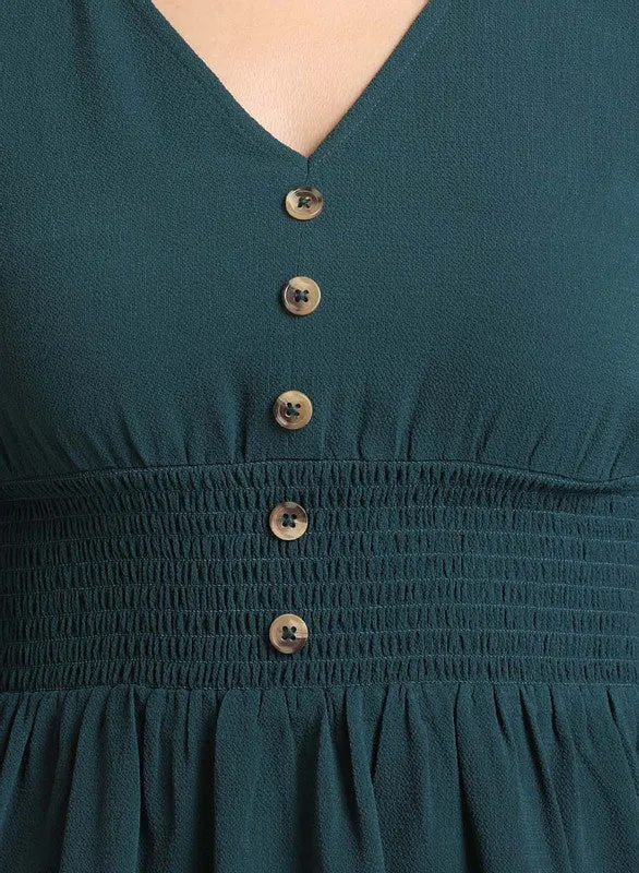 Peplum Top With Smocking At Waist